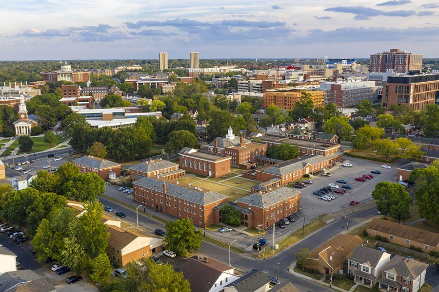 Richmond, KY - Aerial View of Lexington Kentucky Displaying Many Rural and Business Buildings and Trees